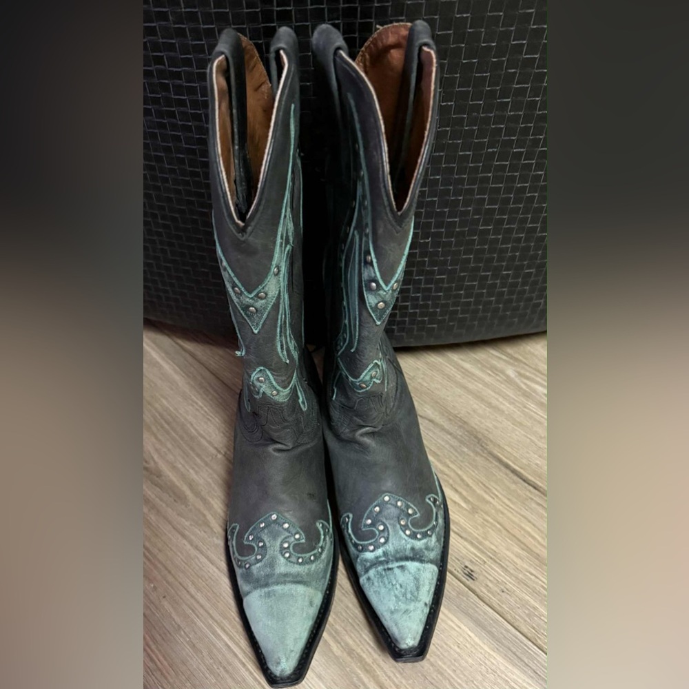 Eight Black and Teal Western Boots